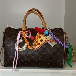 Hand assembled custom curated bag charm/chains